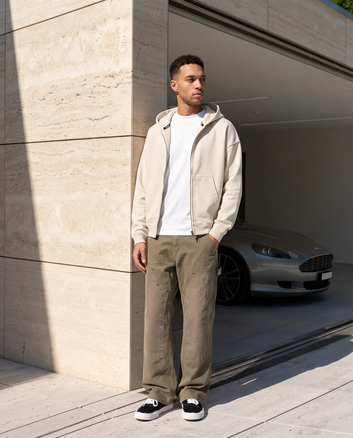 A man in a travertine garage